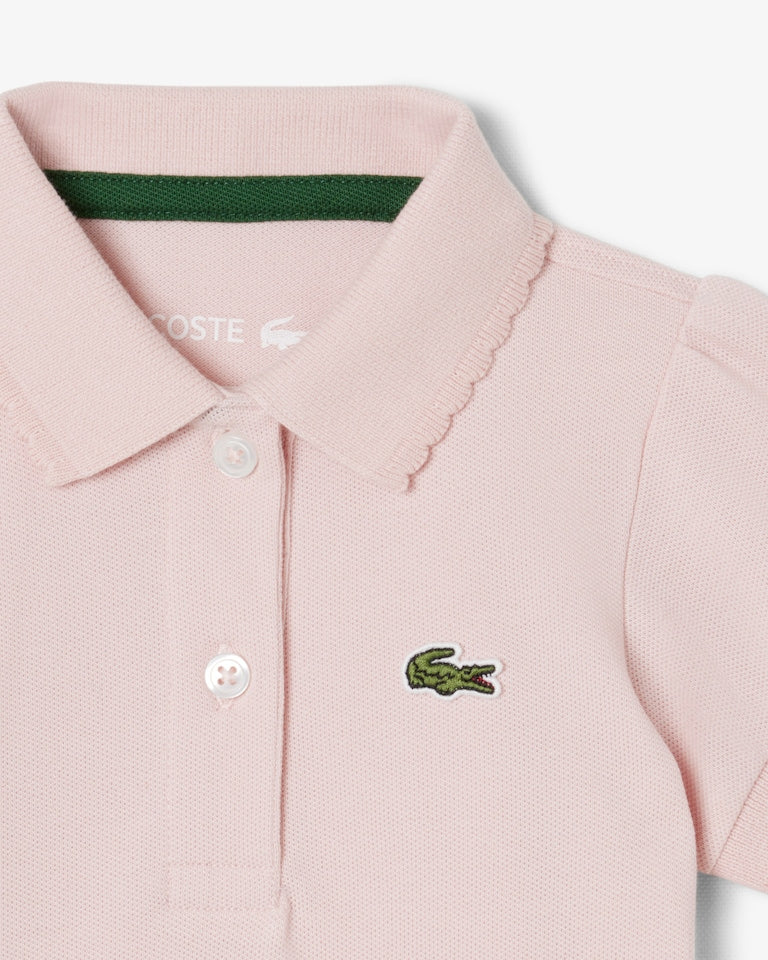 Lacoste Body neonato in piqué con collo smerlato